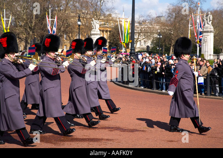 The Coldstream Guards Regiment with regimental band  playing music and marching at the Changing of The Guard Buckingham Palace Stock Photo