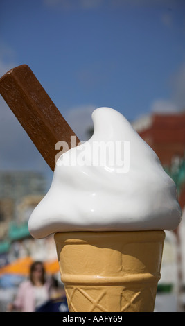 Giant plastic ice cream cone on Brighton beach UK Stock Photo