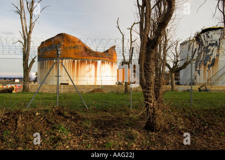 Damaged oil tank at Buncefield oil depot in Hemel Hempstead, Hertfordshire, UK Stock Photo