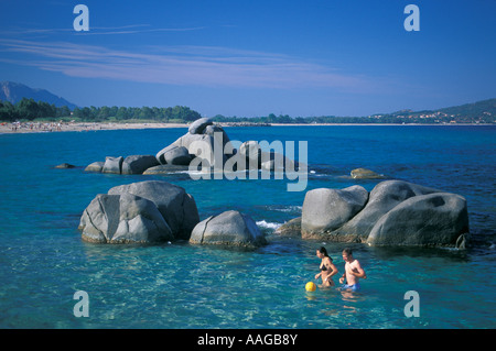 Couple playing in water Lido di Orri Tortoli Ogliastra Sardinia Italy Stock Photo