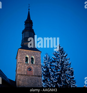 Church tower and Christmas tree lights St Gervais les Bains Haute Savoie Rhone Alpes France Stock Photo
