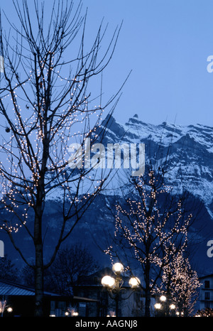 Mont Blanc and Christmas tree lights St Gervais les Bains Haute Savoie Rhone Alpes France Stock Photo