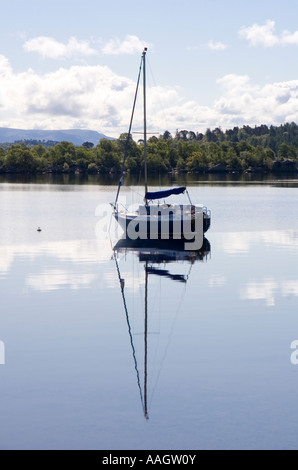Sailing boat at anchor on Loch Lomond near Luss Pier, Luss, Argyll and Bute, Scotland Stock Photo