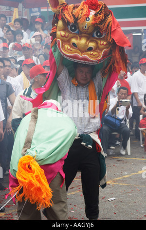 Man Holding Up Chinese Dragon At Matsu Festival Stock Photo