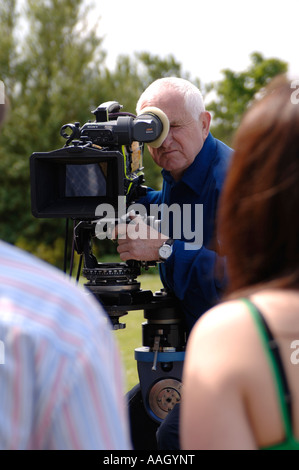 Ray Orton award winning cameraman filming on location in west wales for a S4C (sianel pedwar cymru) drama programme Stock Photo