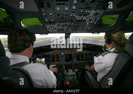Pilot and co pilot working in a Boeing 737 editorial use only no negative publicity Stock Photo