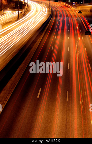 Night time shot of speeding traffic on a freeway Stock Photo