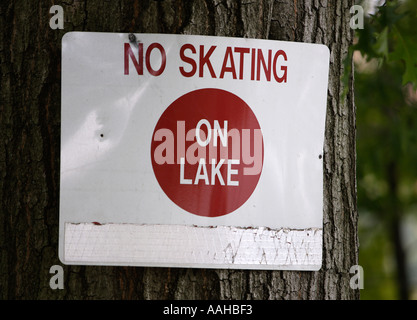 Warning sign near a lake Stock Photo