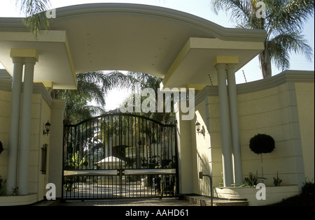 Imposing wrought iron entrance gates to luxury home in Rosebank a suburb of Johannesburg South Africa Stock Photo