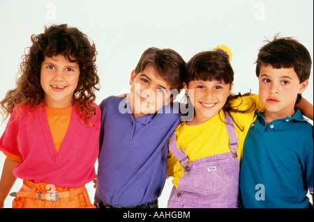 Children 6 7 standing with arms around portrait Stock Photo