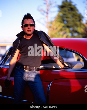 Tokyo Rockabilly with his classic American car relaxing in 