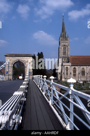 The suspension bridge and All Saints Parish Church at Marlow Stock Photo