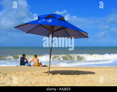 Beach life on Praia do Ponta Negra beach in Natal Brazil Stock Photo