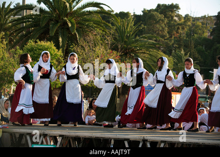 GREECE IONIAN CEPHALLONIA ARGOSTOLI PLATIA VALLIANOU SCHOOLCHILDREN PERFORMING TRADITIONAL GREEK DANCE IN THE MAIN SQUARE Stock Photo