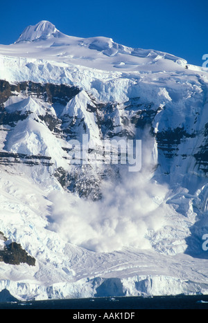 ANTARCTICA, Antarctic Peninsula AVALANCHE falling from hanging glacier Stock Photo