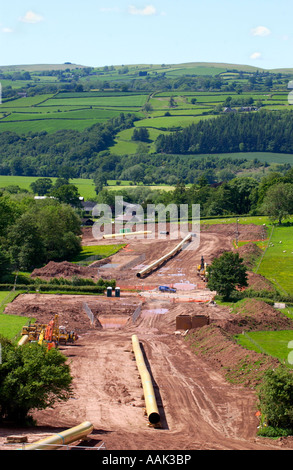 LNG pipeline being constructed on hillside  farmland above Hay on Wye Powys Wales UK Stock Photo