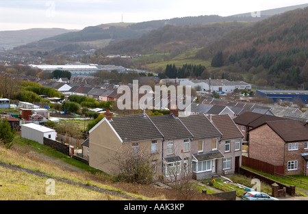 View down Rhondda Valley showing terraced housing and factories in Treorchy South Wales UK Stock Photo