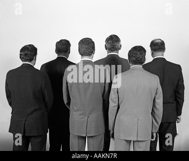 1960s BACK-VIEW OF SIX BUSINESS MEN Stock Photo