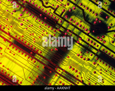 1970s 1980s CLOSE-UP PATTERN OF COMPUTER CIRCUIT BOARD Stock Photo