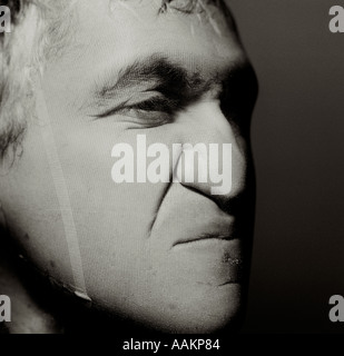 Head of a Man in Stockings Stock Photo