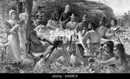 THE FIRST THANKSGIVING DECEMBER 13 1621 PILGRIMS SHARING HARVEST MEAL WITH NATIVE AMERICAN INDIANS PLYMOUTH COLONY MA Stock Photo