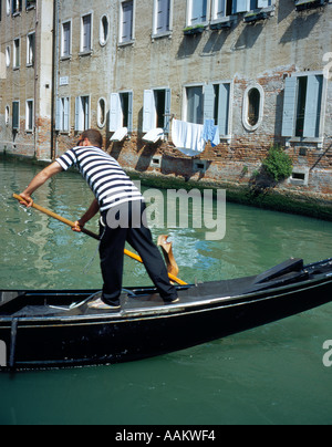 gondolieri rowing Venice Italy Europe. Photo by Willy Matheisl Stock Photo