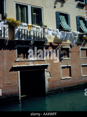 laundry hanging on balcony in Venice, UNESCO World Heritage Site,  Italy, Europe. Photo by Willy Matheisl Stock Photo