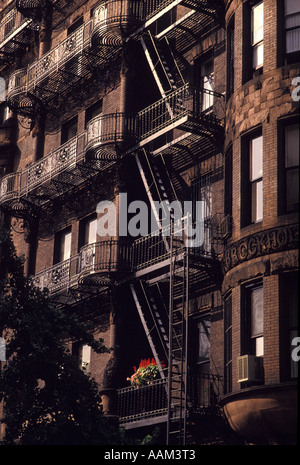 Fire ladder outside building typical architecture of New York City USA Stock Photo