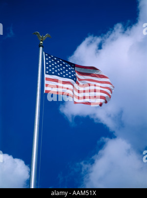 AMERICAN FLAG ON POLE WITH GOLD EAGLE Stock Photo