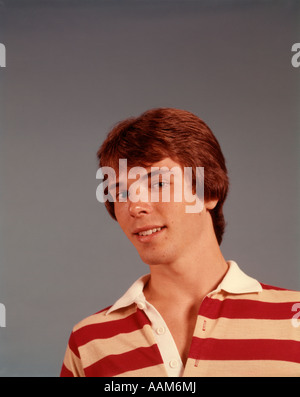 1970 1970s YOUNG MAN BOY RED HAIR STRIPED COLLAR SHIRT RETRO Stock Photo