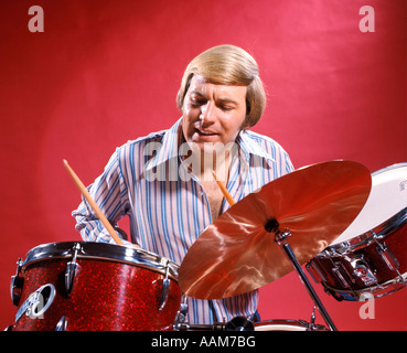 Drummer R Player Men Drummer playing on drum set on stage Stock Photo - Alamy