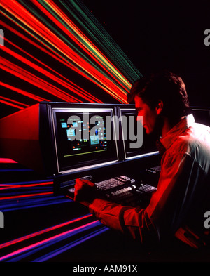 MAN USING COMPUTER SPECIAL EFFECTS 1980 1980s 1990 1990s Stock Photo