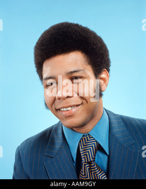 AFRICAN AMERICAN MAN SMILING BUSINESSMAN BUSINESS 1970 1970s RETRO Stock Photo
