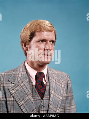 1970s RETRO PORTRAIT OF MAN WEARING PLAID SUIT VEST AND BIG TIE BLOND Stock Photo
