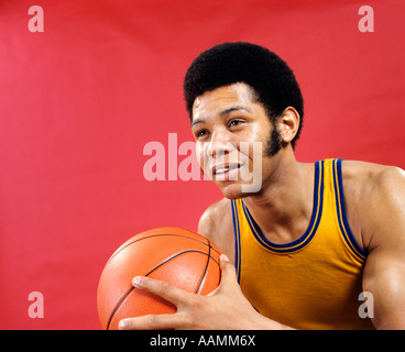 1970 1970s RETRO MAN BASKETBALL SIDEBURNS AFRO Stock Photo
