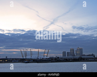 sunset over  02 arena millenium dome, view from canary wharf, London, England skyline evening Stock Photo