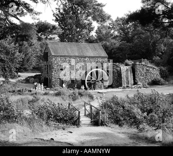 RUSTIC GRIST MILL WITH STONE STRUCTURE & WATERFALL SUDBURY MASS. Stock Photo