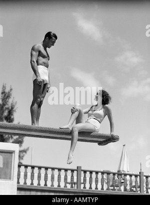 1930s WOMAN ON POOL DIVING BOARD PALM TREE Stock Photo - Alamy