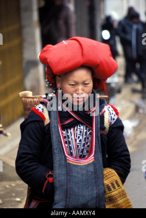 Red Dao hill tribe/ethnic minority woman keeping hands warm, Sapa, Tonkinese Alps, North Vietnam Stock Photo