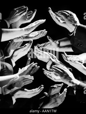 1950s MULTIPLE EXPOSURE MONTAGE HANDS CLAPPING CLAP APPLAUSE APPROVAL AUDIENCE NOISE SOUND ENCORE THANK YOU APPRECIATION WELL Stock Photo
