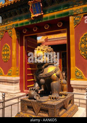 Statue of a lion guarding a gateway in the Forbidden City in Beijing, China Stock Photo