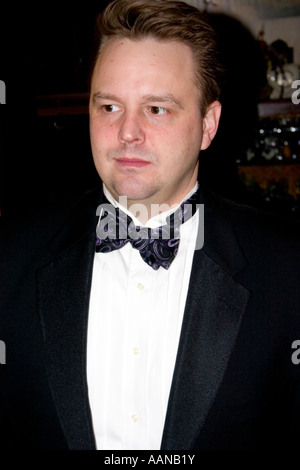Handsome man dressed in a tuxedo.  St Paul Minnesota USA Stock Photo
