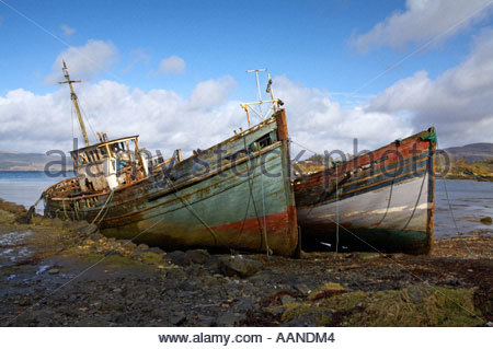 Two old ruined wooden boats at Salen, Isle of Mull, SCOTLAND Stock Photo