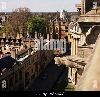 Gargoyle on St Mary's Church Tower Radcliffe Square on right and Brasenose College on left Oxford University Stock Photo