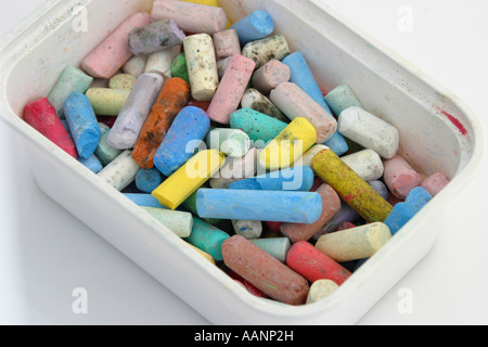 Childs coloured chalk in plastic tub Stock Photo