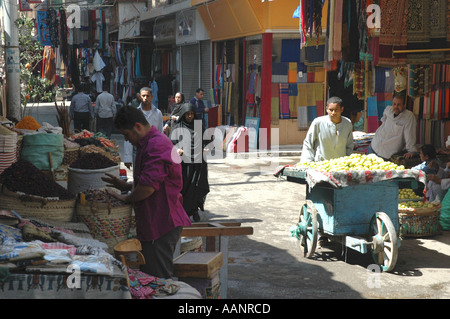 Barrow boy delivering fresh goods to stalls on Luxor Bazaar street Stock Photo