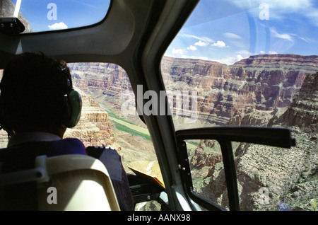 View of the Grand Canyon and inside helicopter from helicopter tour over Arizona USA Stock Photo