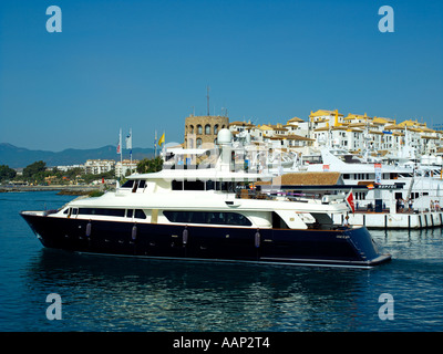A motor-yacht sailing from the marina of Puerto Banus near Marbella, Spain Stock Photo