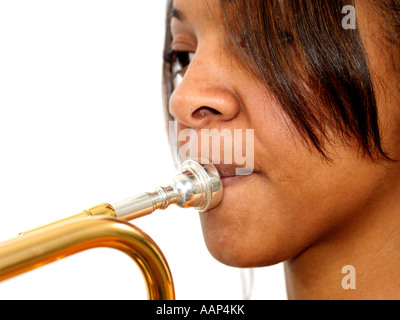 Portrait of young girl playing the trumpet Stock Photo - Alamy