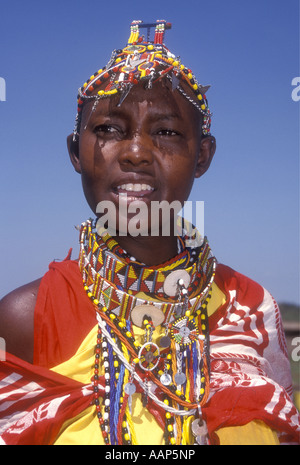 Portrait of a young Maasai woman wearing traditional bead ornaments Masai Mara National Reserve Kenya East Africa Stock Photo